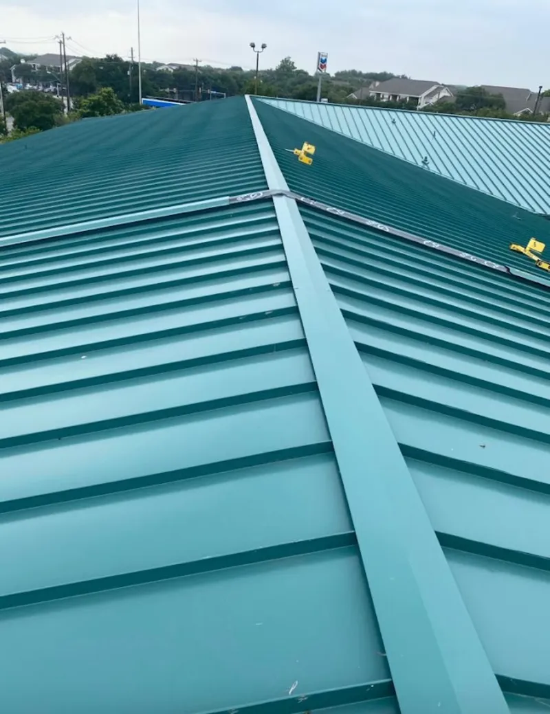 Green commercial metal roof ridge and valley for Metal Roof Repair in Lawndale